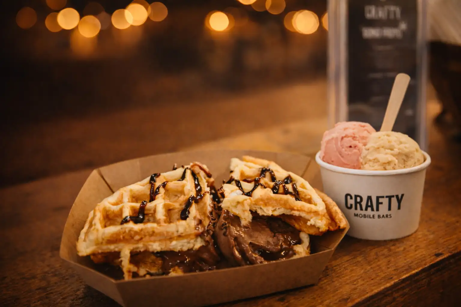 Mobile dessert bar serving waffles at an event